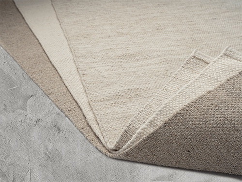 Vloerkleed Stockholm Crème – Platgeweven Wolmix met Juterug – detail van de geweven structuur