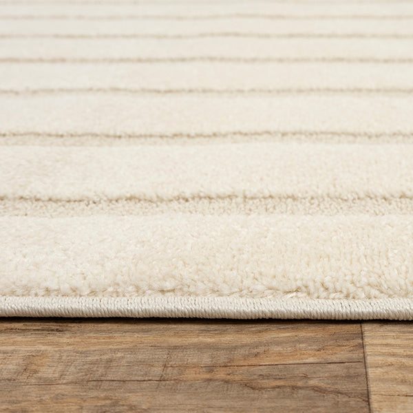 Vloerkleed Elio 2306 Crème – Laagpolig in twee ruime maten – sfeerimpressie voor de bank