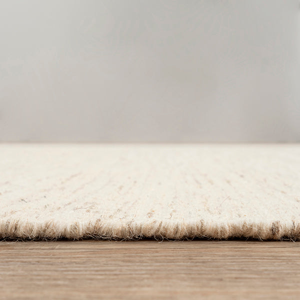 Vloerkleed Scandic Crèmebeige – Scandinavisch platweefsel in wol en katoen – detail van de wol- en katoenstructuur