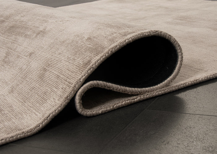 Vloerkleed Arte Lichtbeige – Viscose pool met warme uitstraling – detail van de pool