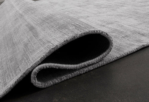 Vloerkleed Arte Grijs – Handgetufte viscose, ook rond verkrijgbaar – detail van de viscose pool