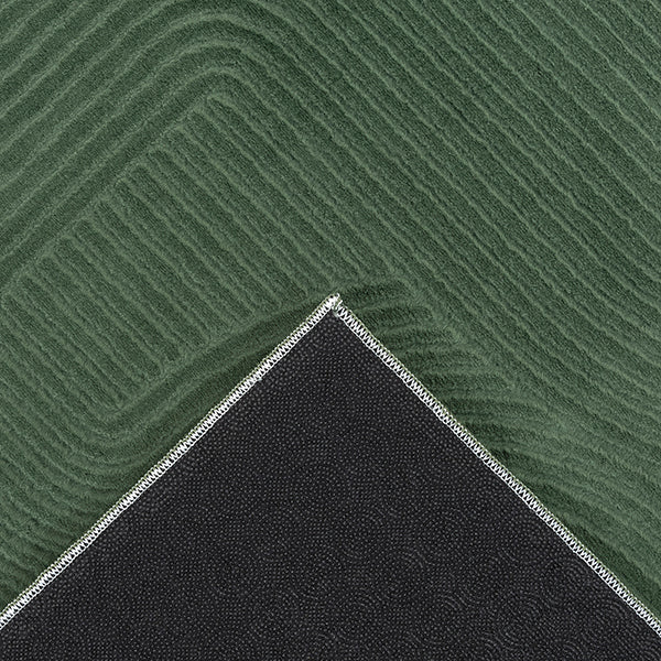 Vloerkleed Stilo 390 Bosgroen – Laagpolig geweven met juterug – detail van de vlakke pool