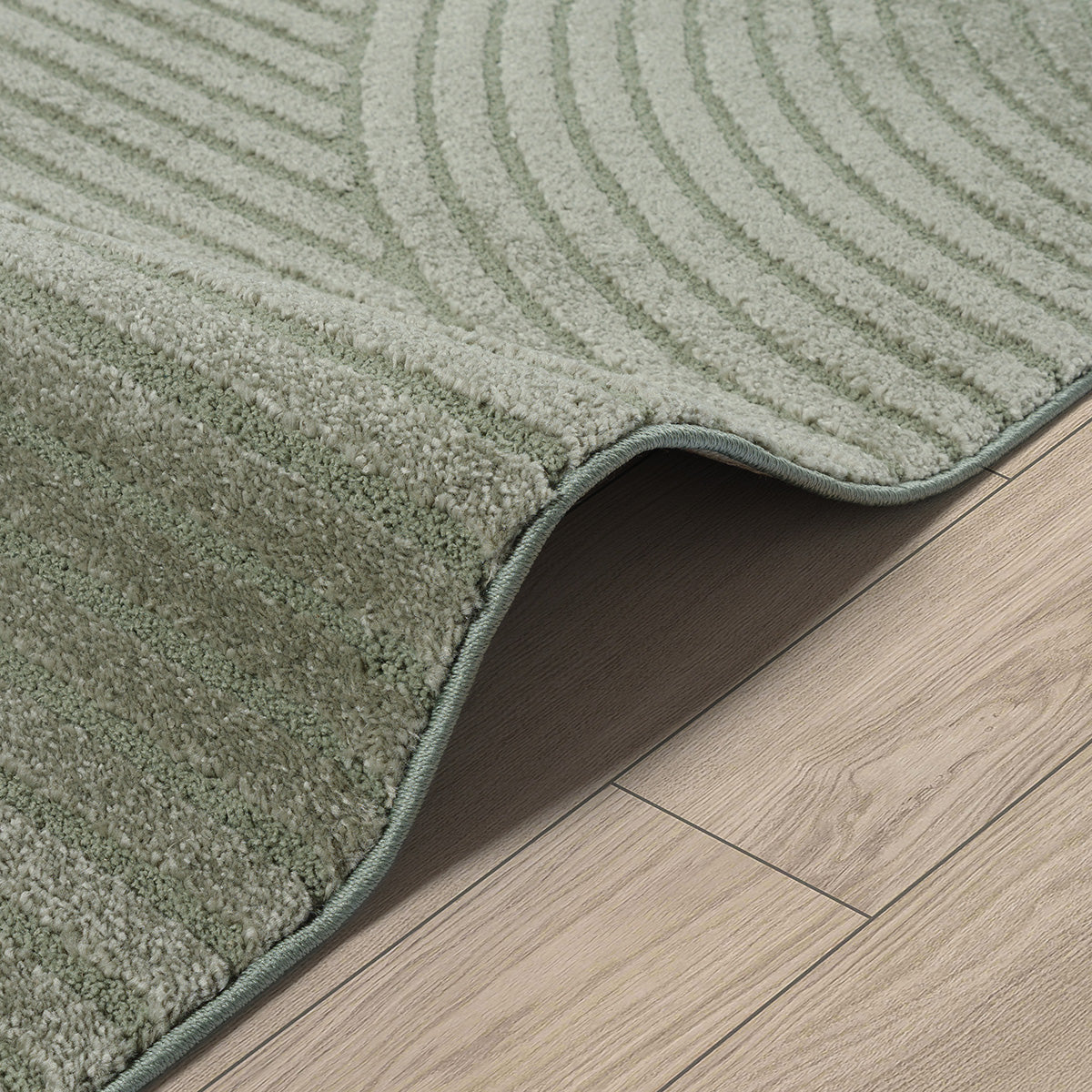 Vloerkleed Elio 2251 Groen – Laagpolig geweven met jute rugzijde – detail van de groene pool