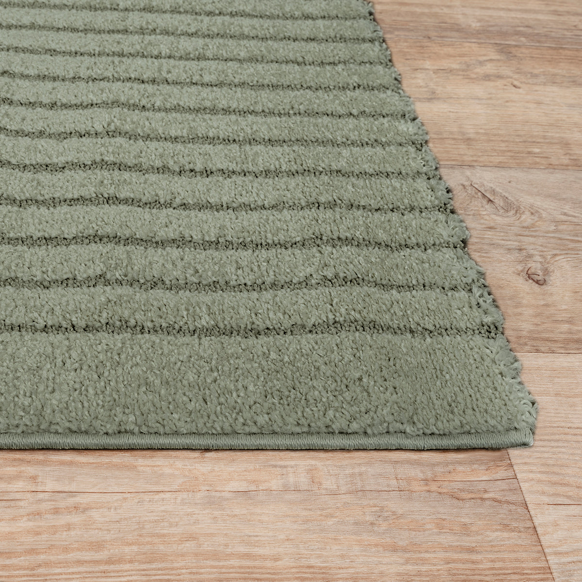 Vloerkleed Eclipse 2320 Groen – Laagpolig met modern cirkelmotief – sfeerimpressie in de woonkamer