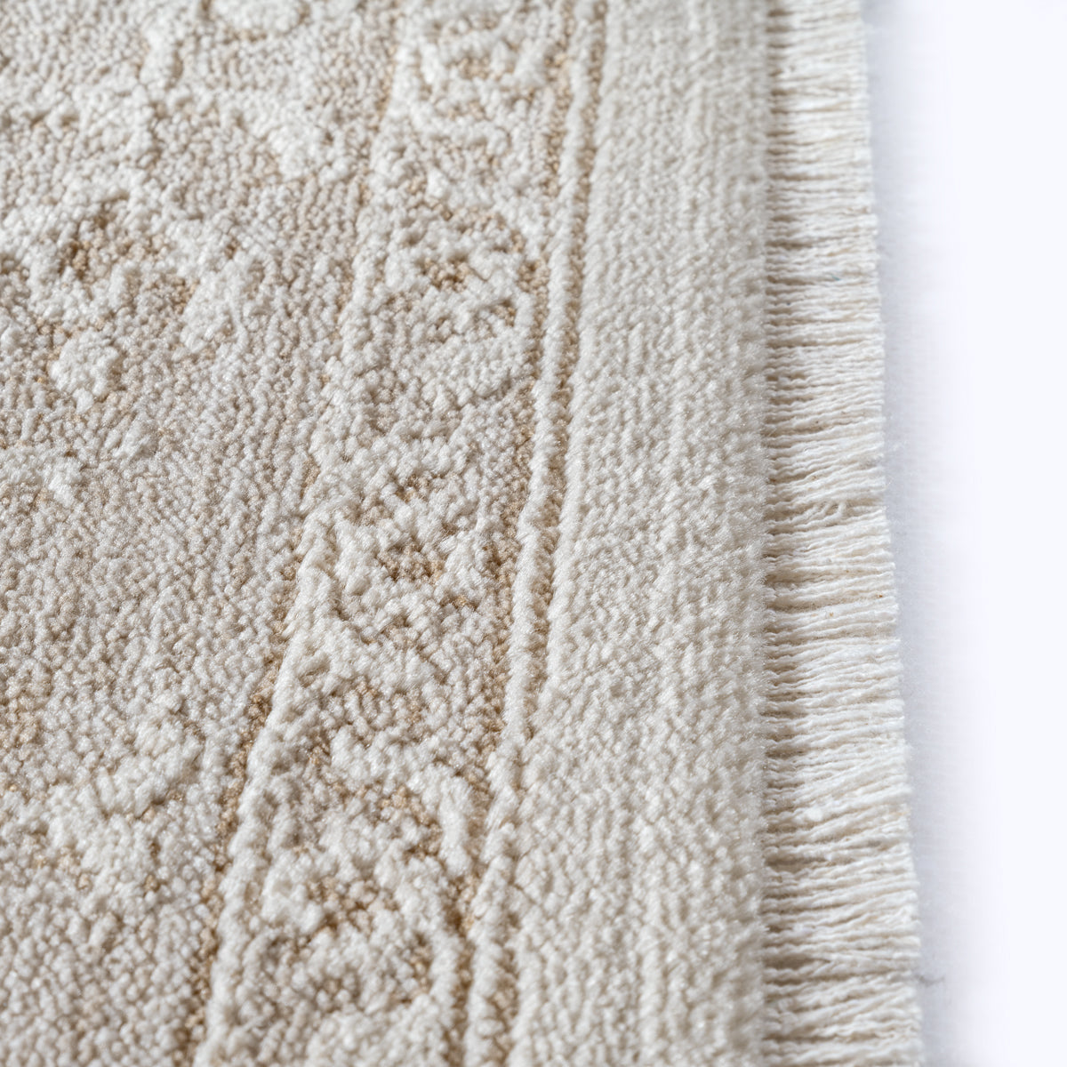 Vloerkleed Flowline 52073 Beige – Laagpolig Geweven met Katoenen Rug – detail van de pool