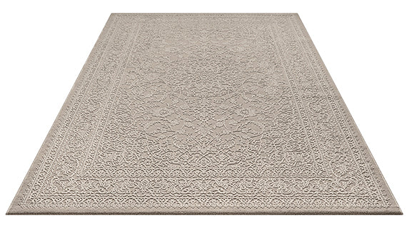 Vloerkleed Sign 1978 Beige – Rustig Reliëf op Juten Rugzijde – sfeerimpressie naast de bank