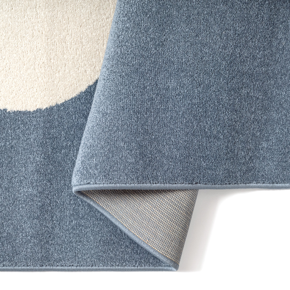 Vloerkleed Sound 40499 Blauw – koele tint met zachte pool – detail van de pool