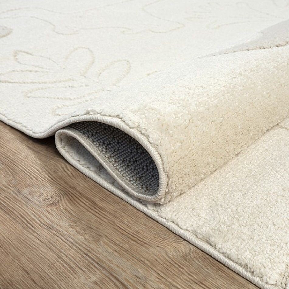 Karpet24 Alina Kids – Schattig Dino Vloerkleed voor Kleine Avonturiers Crème — hoekdetail