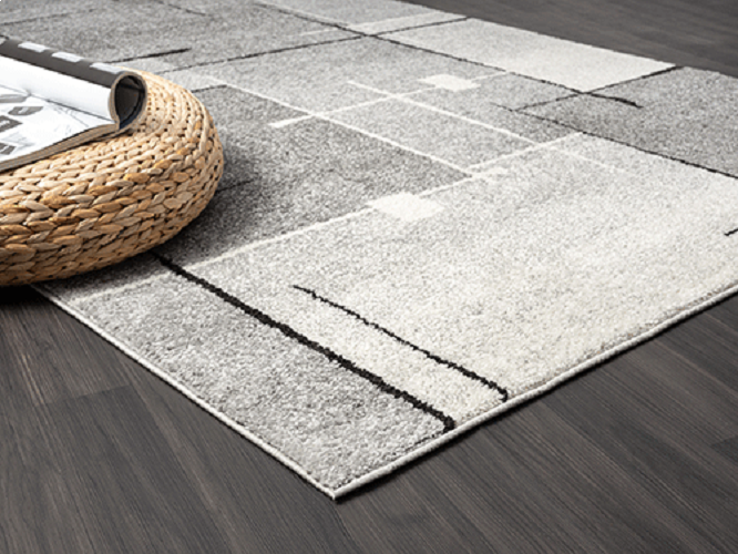 Modern Geometrisch Laagpolig Vloerkleed – Grijs, Zwart & Cream Stijlvolle Blikvanger — sfeerbeeld in interieur