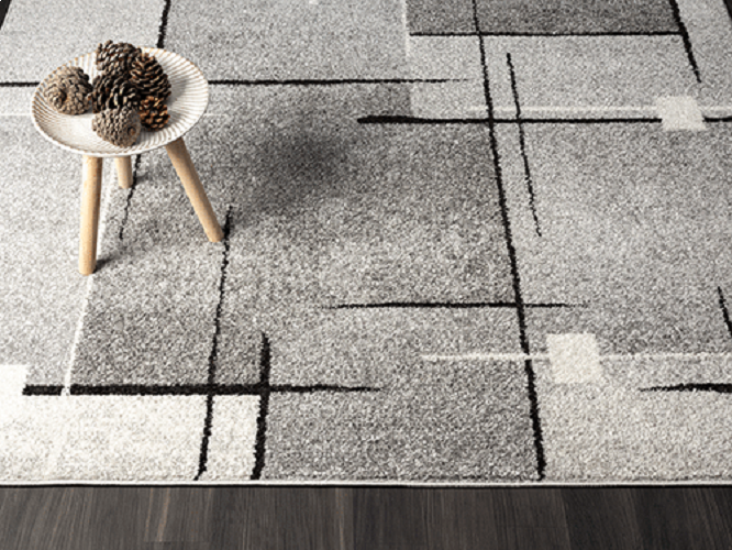 Modern Geometrisch Laagpolig Vloerkleed – Grijs, Zwart & Cream Stijlvolle Blikvanger — hoek