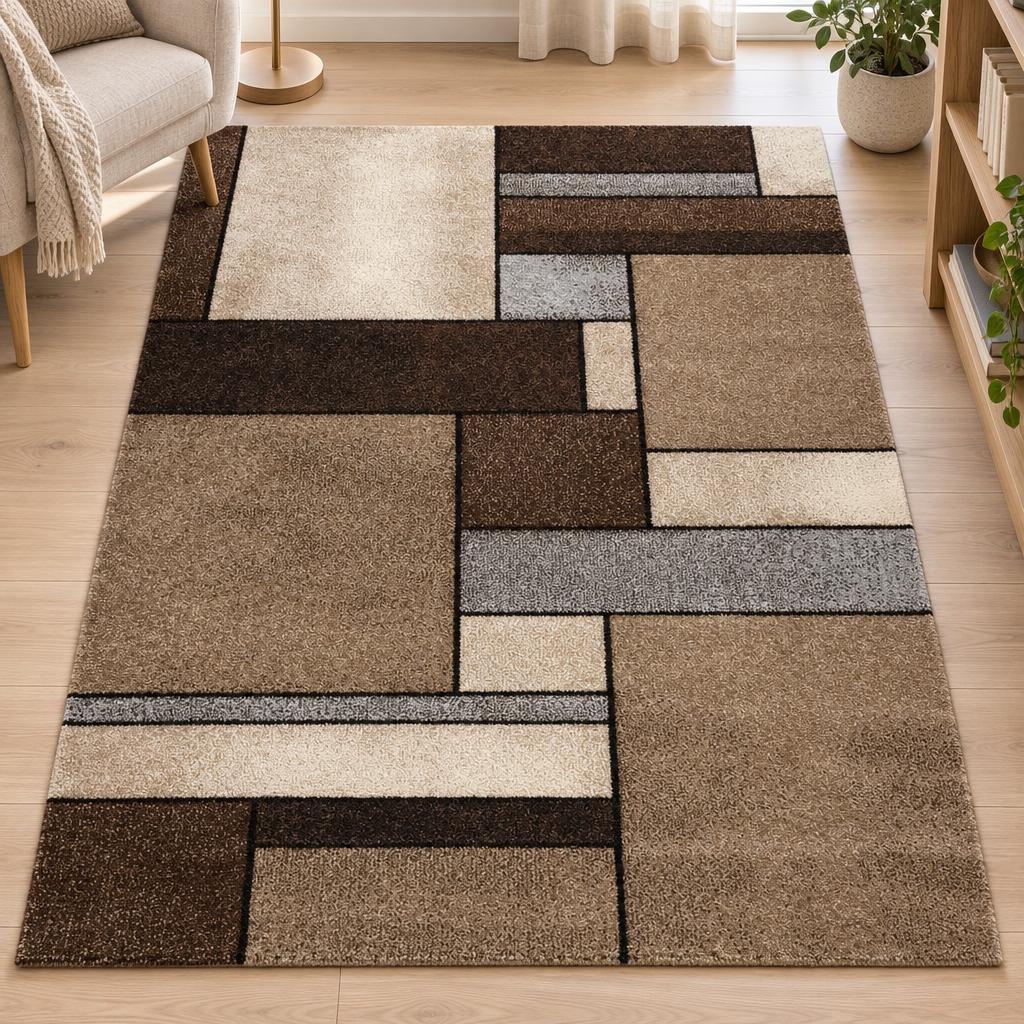 Vloerkleed Brilliance Beige, laagpolig met blokken in bruin, beige, crème en grijs, in een leeshoek met fauteuil – sfeerimpressie in de woonkamer