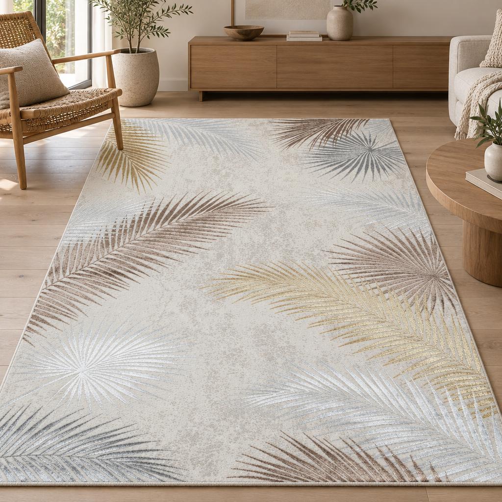 Vloerkleed Creation Crème met palmbladeren in goud-, bruin- en zilvertinten – sfeerimpressie in de woonkamer