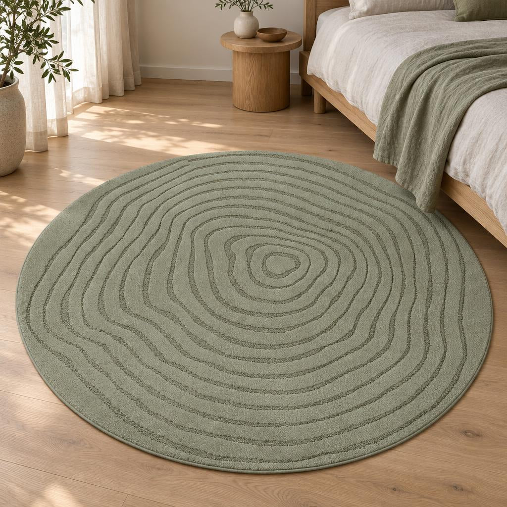 Rond vloerkleed Elio 2325 Groen met ringmotief – sfeerimpressie in de slaapkamer