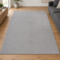Tapis Studio Gris – Médaillon patiné dans des gris doux